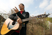 Singing farmer holds concert at his farm