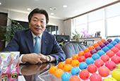 Volvik colored golf balls stand tall in green fields