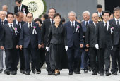 Park urges Pyongyang to give up nukes in memorial speech 