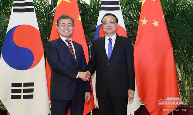 President meets Chinese premier, congress chairman