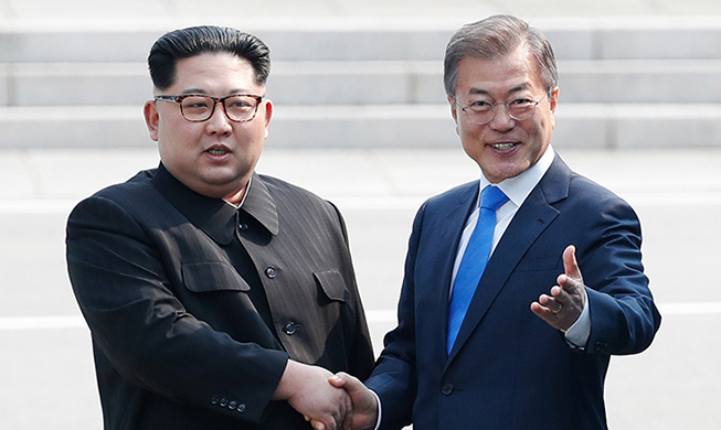 President Moon, Chairman Kim have historic first meeting