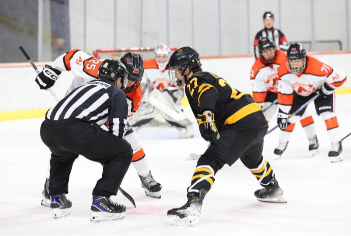 Heated competition on ice hockey rink